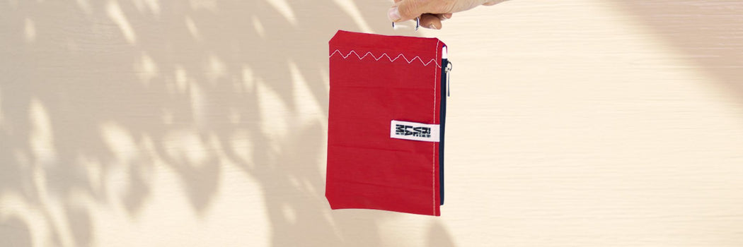 pochette impermeabile in tessuto tecnico vela di rivelami